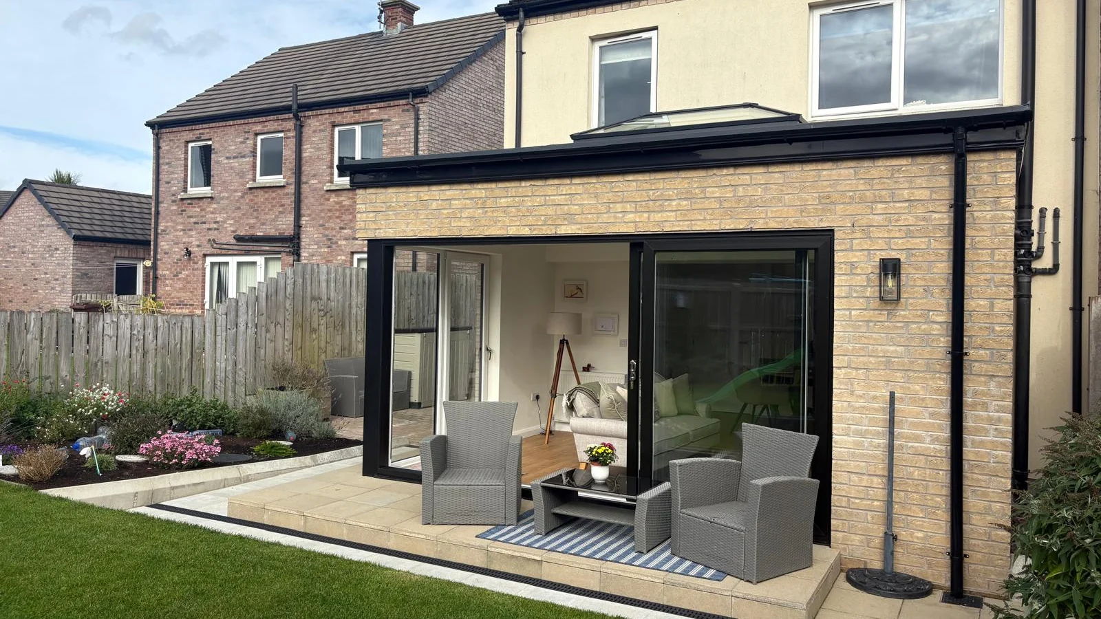 Ballynahinch sunroom, sliding doors and finished patio