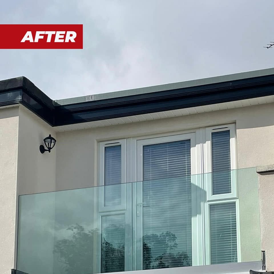 Glass balcony balustrade in front of new bedroom doors, labelled after