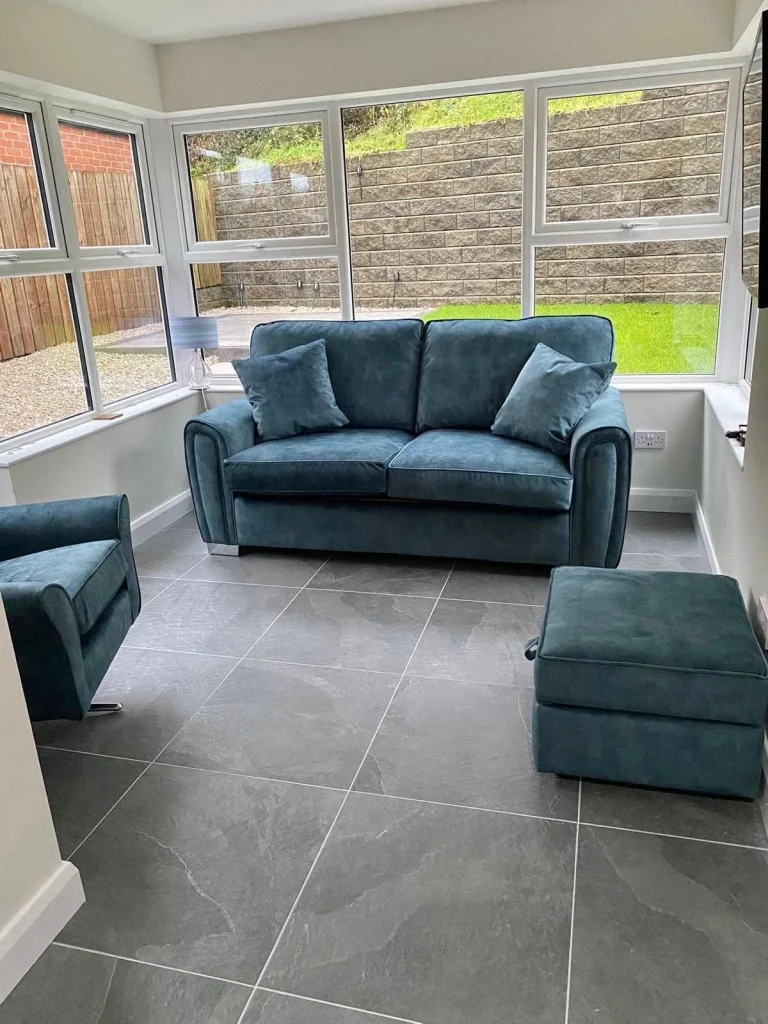Furnished sunroom with garden glazing