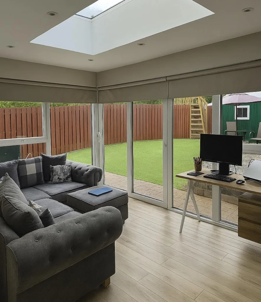 Lounge and home office beneath a rooflight