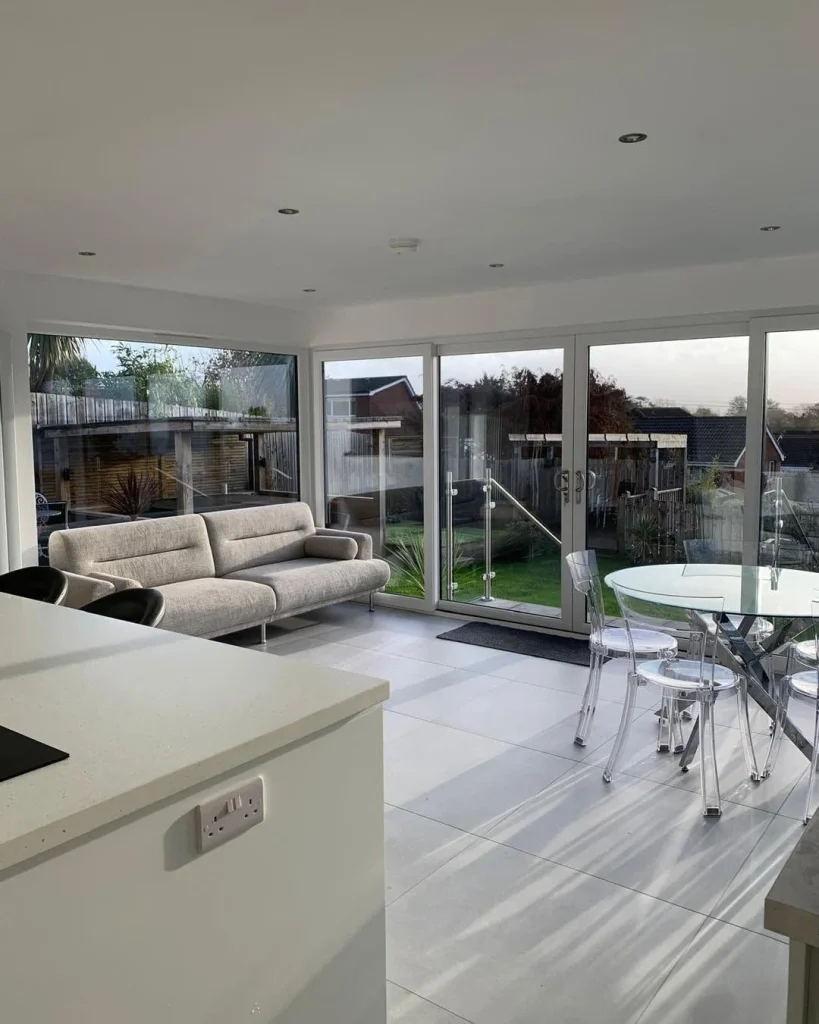 Open plan lounge with glazing towards the garden