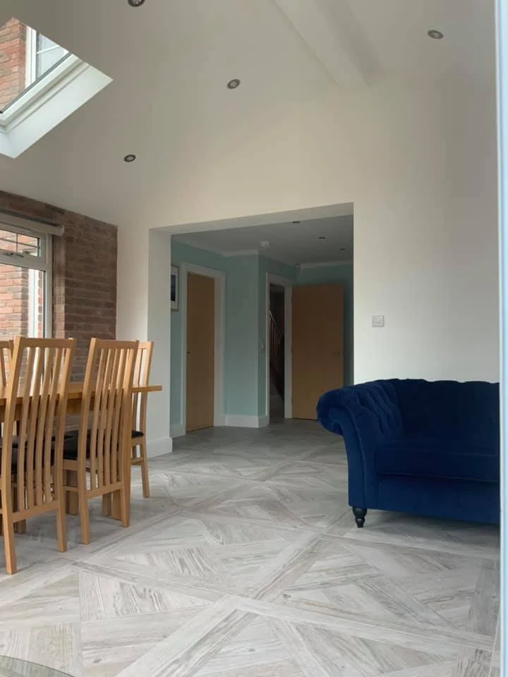 Dining and seating areas beneath the sunroom rooflights